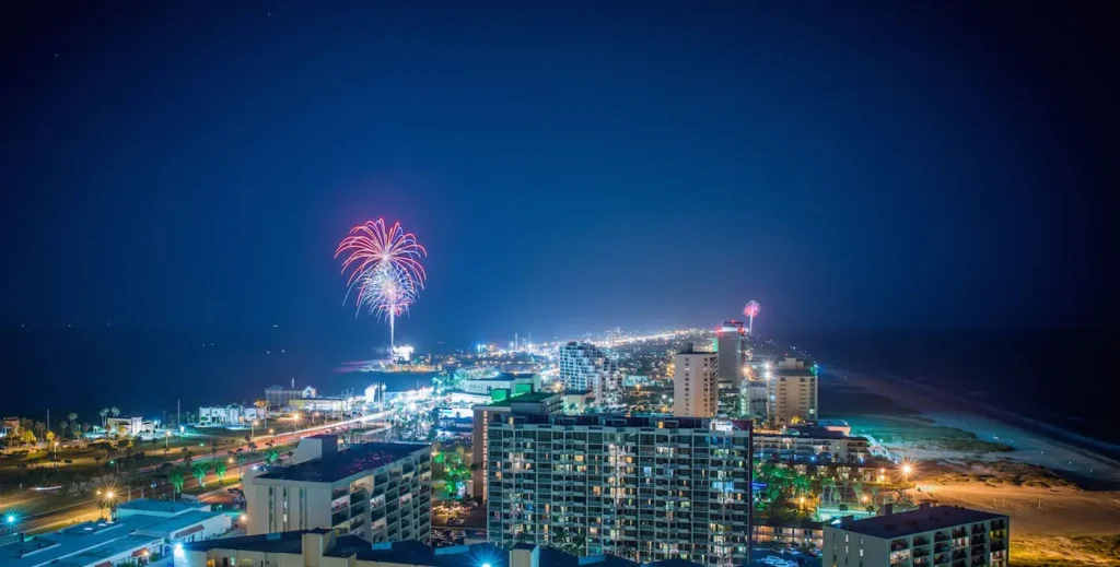 fireworks in the sky over a city
